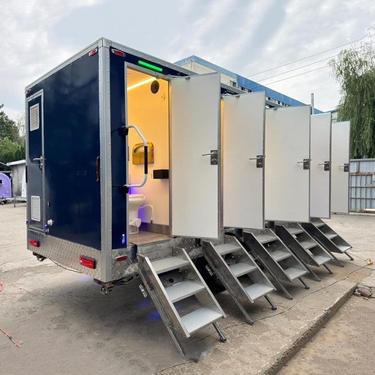 Multi-station portable restroom trailer set up for commercial use
