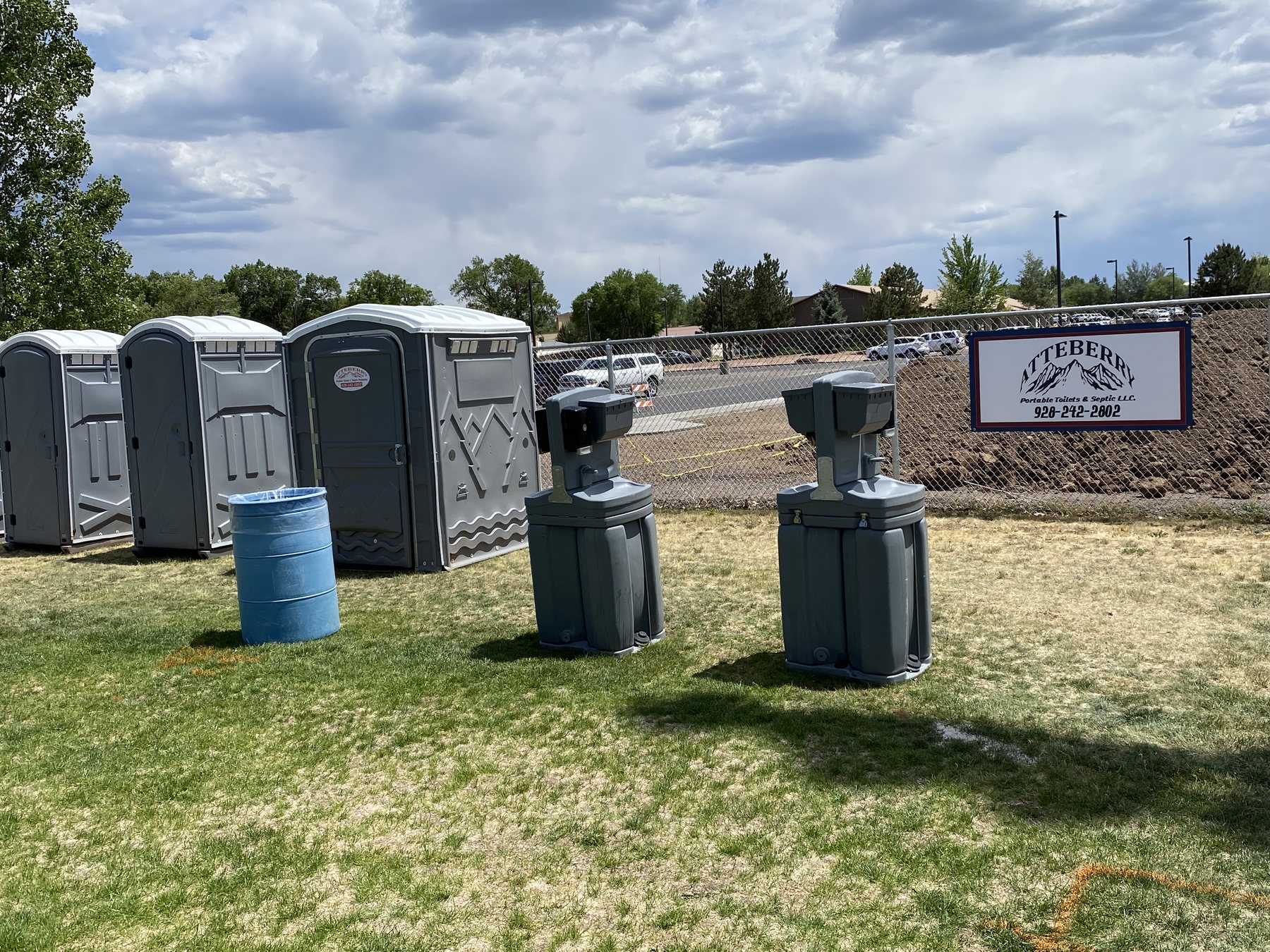 Atteberry portable toilets and handwashing stations set up for an outdoor event